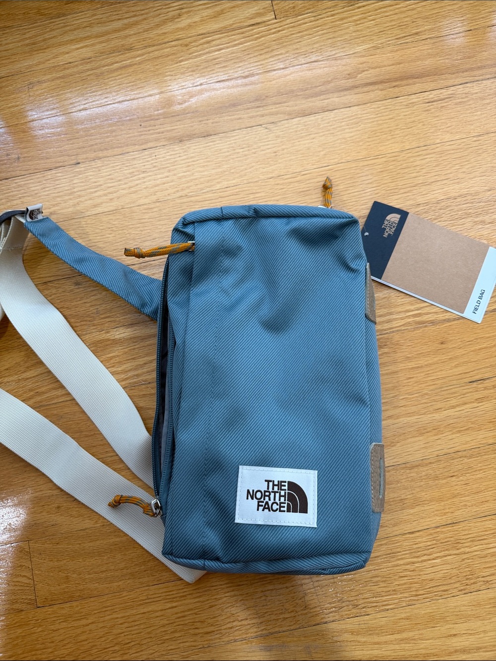 The North Face Teal Sling Bag with Cream Strap New with Tags